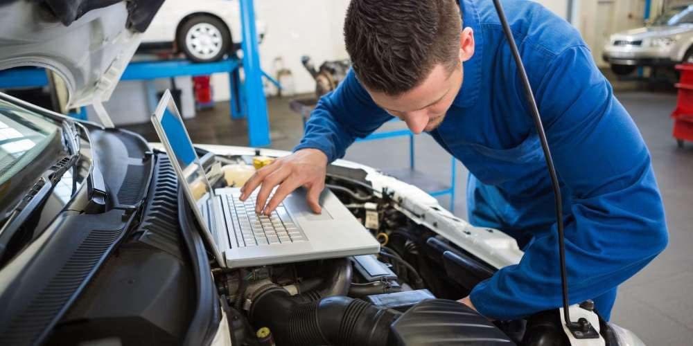 Mechanic working on a car